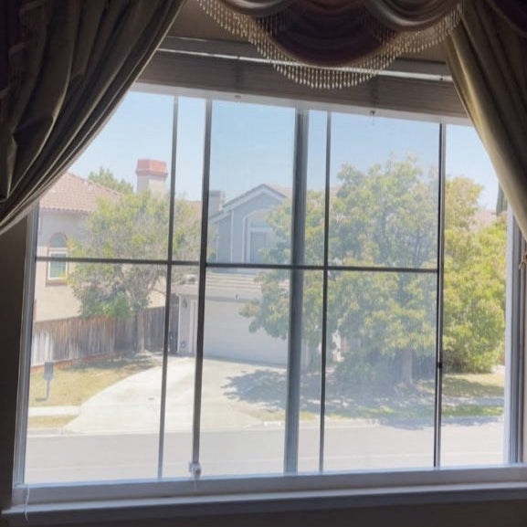 Customer image: SmartSlydr bottom mount installation on a window